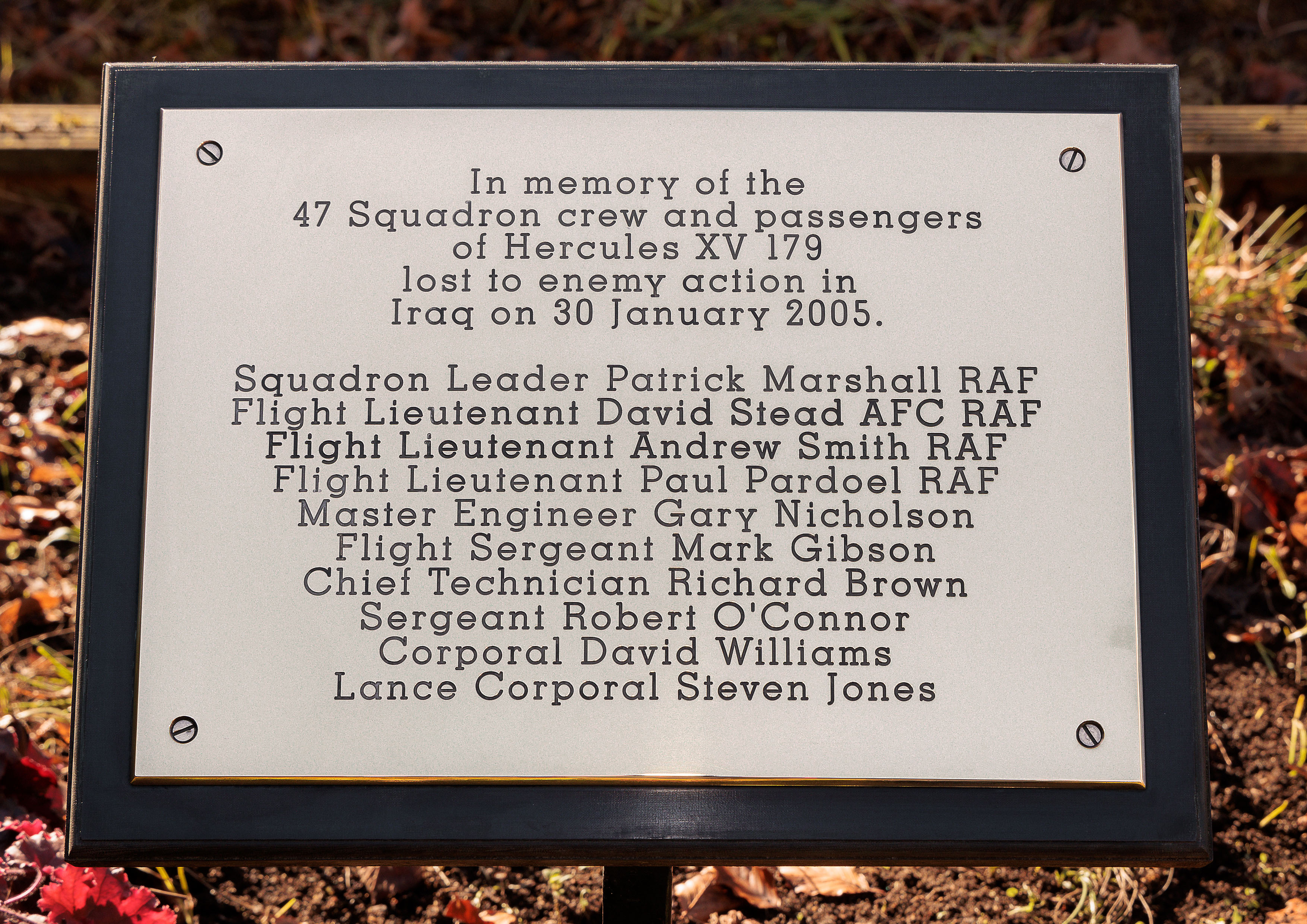 Photo depicting the plaque bearing the of the crew and passengers of RAF C-130K Hercules XV179.